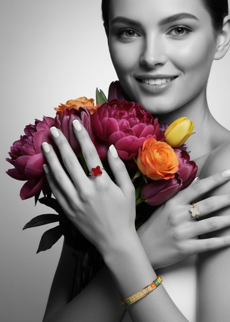 Woman holding a bouquet of flowers with a focus on jewelry