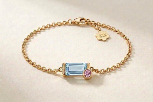 Tessere chain bracelet in 18K gold with a rectangular aquamarine and pink sapphire accent – DONYDO