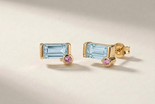 Tessere stud earrings in 18K gold with rectangular aquamarines and pink sapphire accents, pair at an angle – DONYDO